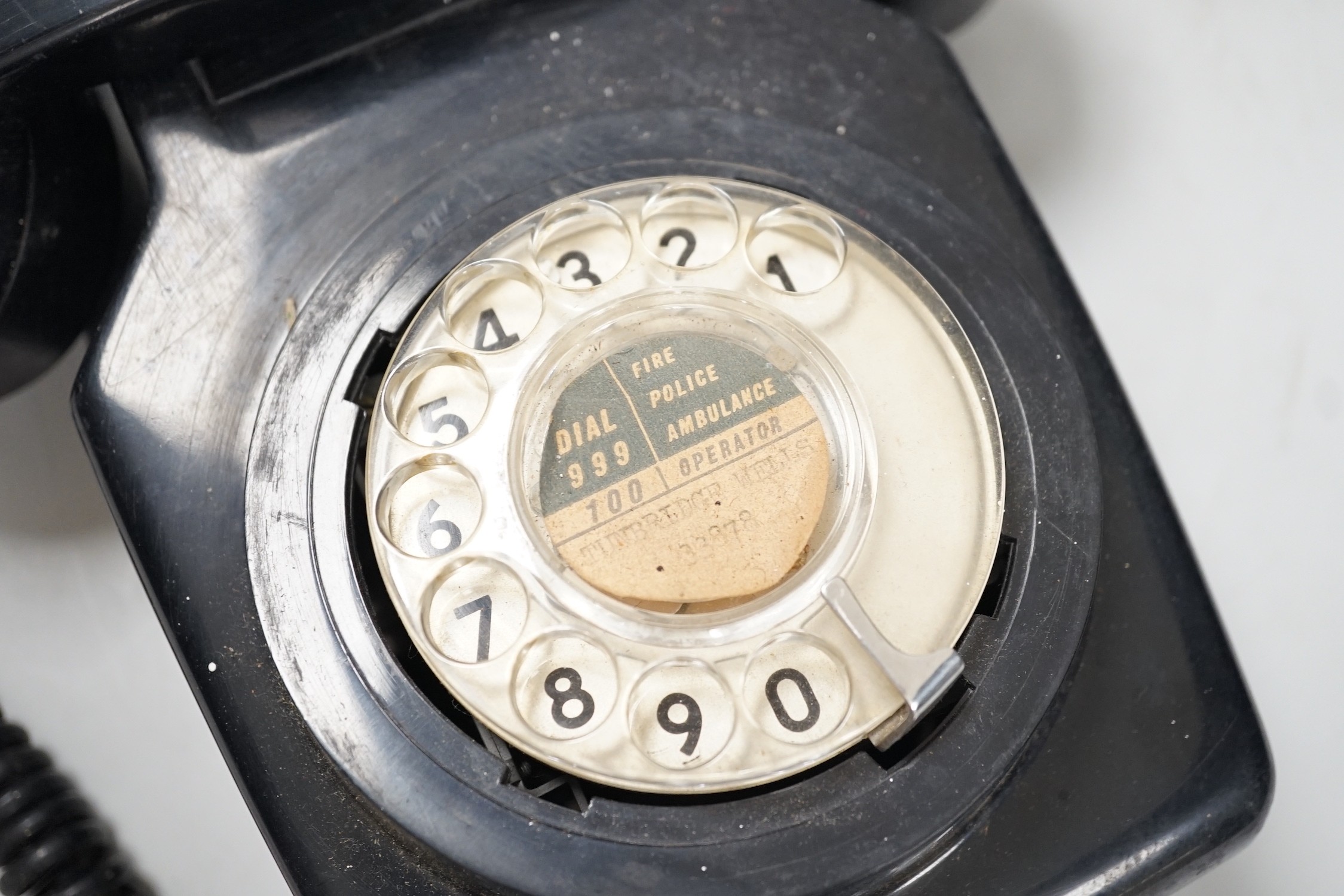 A black Bakelite telephone